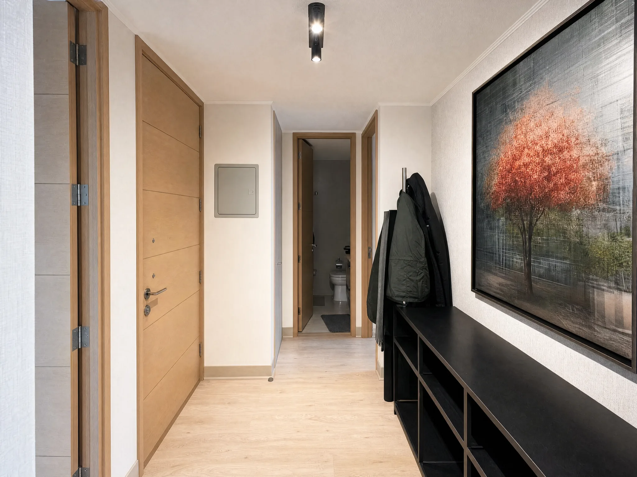 Hall de acceso con baño de visitas